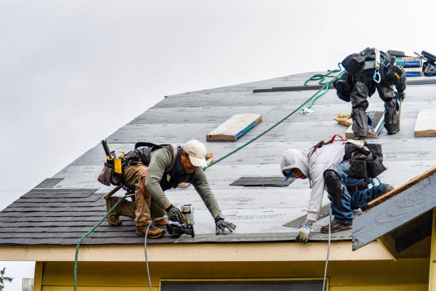 Professional Storm Damage Roof Repair technician working in Baldwinsville, NY